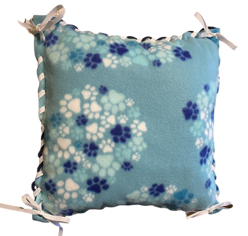 Fleece pillow kit with teal, dark blue and whit paw prints