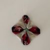 Christmas Ornament - Fabric Star Ornament made from two 5 inch squares with Bone colored outer fabric and Red colored inner fabric, small green bead in center and small loop to hang