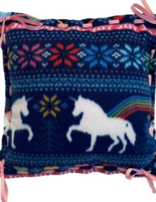 Fleece Pillow with Unicorns and Rainbow Pattern in Navy, White, Pink, Green laced with pink ribbon