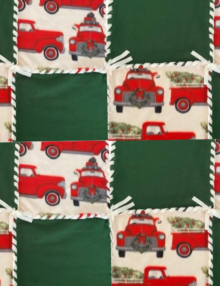 Fleece No Sew 48 inch Patchwork Blanket, Christmas Truck and Tree Pattern includes 8 white squares with Red Pickup toting evergreen tree in back and Lab dog with Red hat in cab, alternated with 8 solid green squares