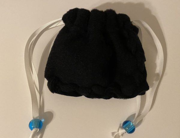 fleece 4 inch drawstring pouch with beads (black solid fleece with white ribbon and blue beads)