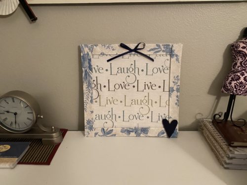 Live Laugh Love Wall Hanging Kit with Home Decor fabric with Live Laugh Love writing in Teal blue, tan and sage and vintage style frame in off white with blue floral - desktop version