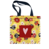 Fleece tote bag Valentine Edition made with Yellow, Red, Black and White Lady Bug Fleece Pattern, front has 5 inch pocket in center with pink heart