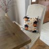 Black cats with pumpkins fleece pillow set in dining room chair
