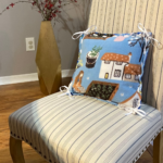 Light blue fleece girls in garden pillow on chair