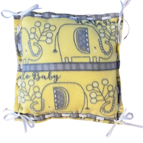 Completed Yellow & Gray Elephants holding white balloons in trunk with text Hello Baby, and white ribbon lacing tied in bows