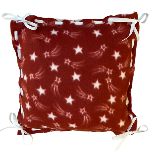 Red fleece with white shooting stars pillow