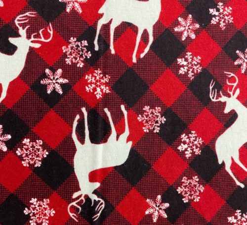 red and black flannel with white deer and snowflake silhouettes