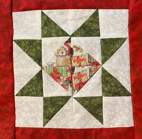 Sawtooth Star with eight green points and Christmas Pattern diamond center
